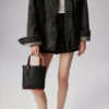 Cabata Mini – Borsa Tote – Pelle di vitello e borchie – Nero Cabata Mini – Borsa Tote – Pelle di vitello e borchie – Nero
