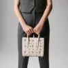 Paloma Mini – Borsa con manico superiore – Pelle di vitello martellata e borchie Loubinthesky – Leche Paloma Mini – Borsa con manico superiore – Pelle di vitello martellata e borchie Loubinthesky – Leche